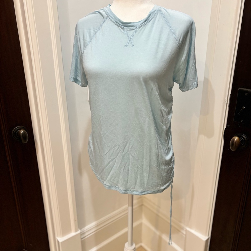 SWEATY BETTY work out shirt powder blue great condition no odors tears or stains